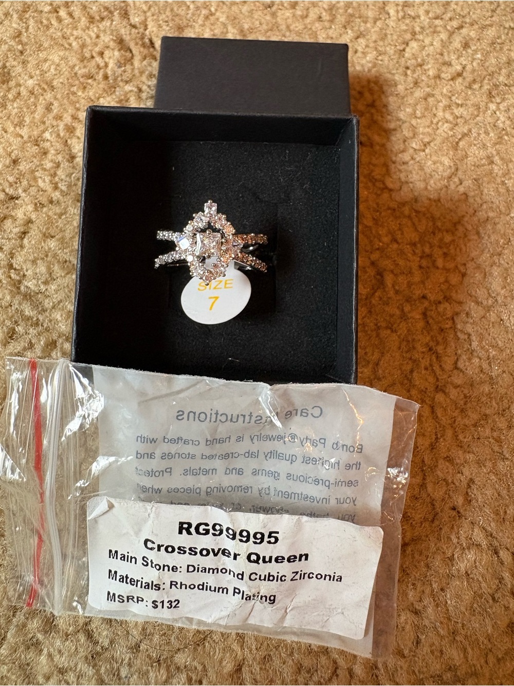 Crossover Queen Rhodium-Plated Ring with Clear Stones - Size 7